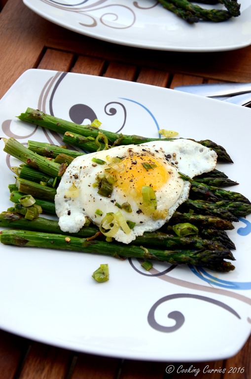 Fried Eggs Over Roasted Asparagus and Green Garlic Herb Butter Sauce ...